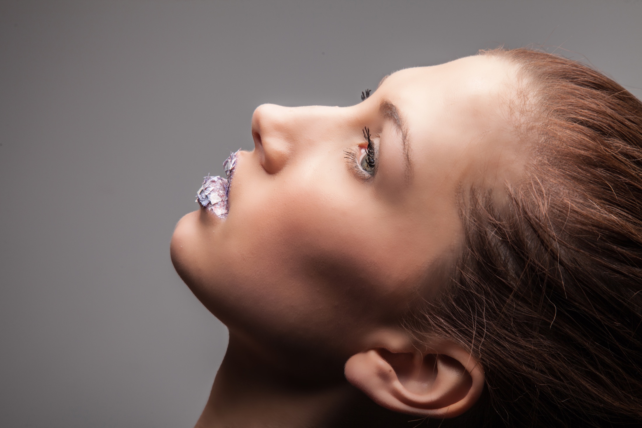 Creative beauty portrait photographed in profile